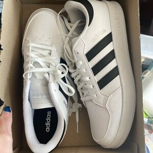 New White with black adidas breaknet women’s tennis shoes.